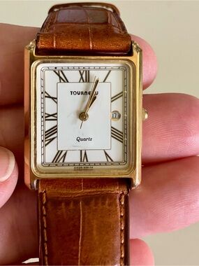 Vintage Tourneau watch, Gold Tone,  model 956.114. Brown Leather Strap. Date